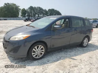 2012 Mazda 5 Sport z VIN JM1CW2BL7C0110420, wystawiony jako Copart lot #59150885 z przebiegiem Nie podano mil oraz Czysty tytuł • Clean title. Historia ofert i sprzedaży dostępna na DreamBid. Obrazek 1.
