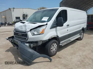 2018 Ford Transit with VIN 1FTYR1YM1JKA98581, listed as a IAAI auction lot 41941407 with 98,543 mi miles and . Bid and sale history available at carsss.com. Image 2.