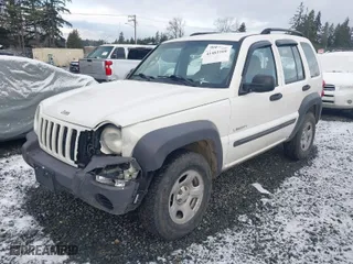2004 Jeep Liberty Sport with VIN 1J4GL48K14W115867, listed as a IAAI auction lot 41482160 with 179,090 mi miles. Bid and sale history available at carsss.com. Image 2.