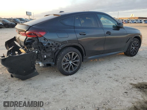 2025 BMW X6 xDrive40i with VIN 5UX33EX09S9Y26463, listed as a Copart auction lot 84269334 with 1,970 mi miles and Salvage Title. Bid and sale history available at carsss.com. Image 3.