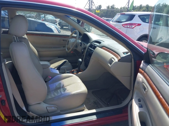 2003 Toyota Solara SE z VIN 2T1CF28P83C606021, wystawiony jako IAAI lot #42497396 z przebiegiem 89 203 mil mil oraz . Historia ofert i sprzedaży dostępna na DreamBid. Obrazek 5.