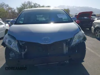 2013 Toyota Sienna LE AAS with VIN 5TDKK3DC6DS371126, listed as a IAAI auction lot 42006353 with 141,425 mi miles. Bid and sale history available at carsss.com. Image 6.