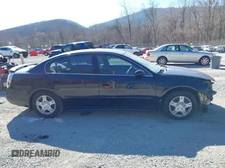 2003 Nissan Altima S with VIN 1N4AL11D33C320084, listed as a IAAI auction lot 41849903 with 212,137 mi miles. Bid and sale history available at carsss.com. Image 13.