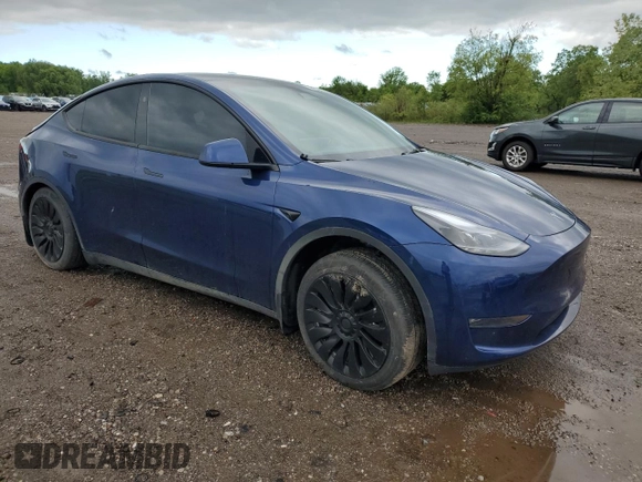 2024 Tesla Model Y Long Range z VIN 7SAYGDEE0RA286070, wystawiony jako Copart lot #58200425 z przebiegiem 16 881 mil mil oraz Szkoda całkowita • Salvage title. Historia ofert i sprzedaży dostępna na DreamBid. Obrazek 4.
