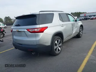 2019 Chevrolet Traverse LT with VIN 1GNERHKW6KJ140036, listed as a IAAI auction lot 41610615 with 98,685 mi miles and . Bid and sale history available at DreamBid. Image 4.
