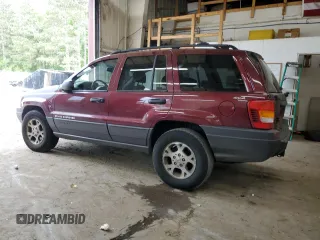 2001 Jeep Grand Cherokee Laredo z VIN 1J4GW48S11C609344, wystawiony jako Copart lot #59258245 z przebiegiem 162 141 mil mil oraz Szkoda całkowita • Salvage title. Historia ofert i sprzedaży dostępna na DreamBid. Obrazek 2.