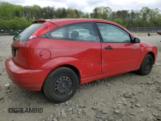 2007 Ford Focus S with VIN 1FAFP31N57W242751, listed as a Copart auction lot 54691345 with 137,224 mi miles and Salvage title. Bid and sale history available at DreamBid. Image 3.