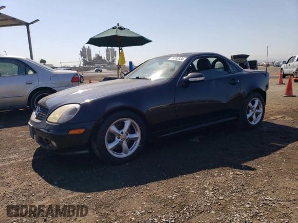 2002 Mercedes-Benz SLK-Class 3.2L with VIN WDBKK65F12F254172, listed as a Copart auction lot 74336334 with 148,405 mi miles and Salvage Title. Bid and sale history available at carsss.com. Image 1.