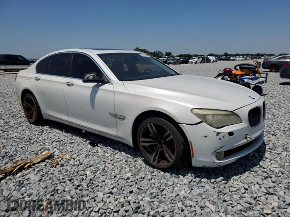 2012 BMW 7 Series 740i with VIN WBAKA4C59CDS99079, listed as a Copart auction lot 53299695 with 142,692 mi miles and Clean Title. Bid and sale history available at carsss.com. Image 4.