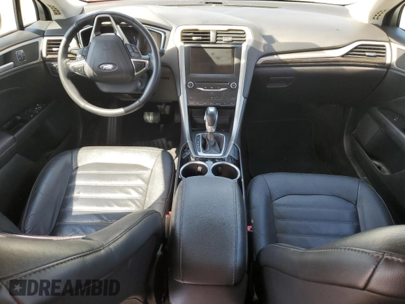 2013 Ford Fusion SE Hybrid z VIN 3FA6P0LU6DR325719, wystawiony jako Copart lot #55777715 z przebiegiem 152 478 mil mil oraz Szkoda całkowita • Salvage title. Historia ofert i sprzedaży dostępna na DreamBid. Obrazek 8.