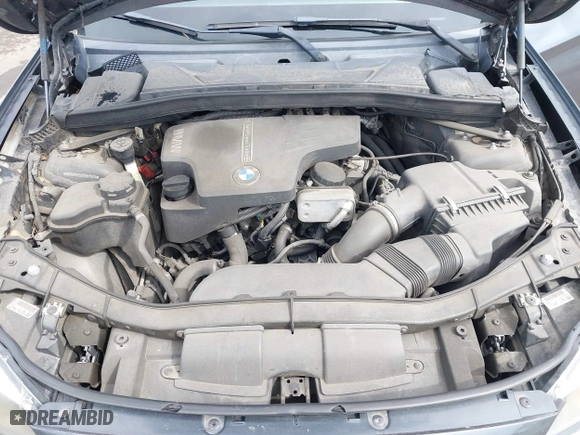 2013 BMW X1 28i with VIN WBAVM1C55DVW41609, listed as a IAAI auction lot 41604038 with 126,036 mi miles. Bid and sale history available at carsss.com. Image 10.