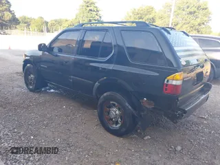 1998 Isuzu Rodeo with VIN 4S2CK58DXW4316412, listed as a IAAI auction lot 42785298 with 262,478 mi miles and . Bid and sale history available at DreamBid. Image 3.