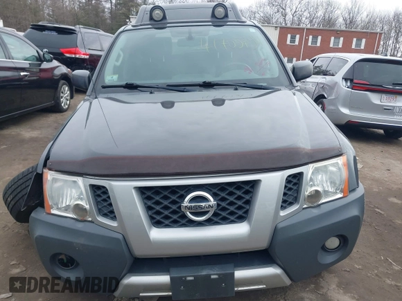 2014 Nissan Xterra X with VIN 5N1AN0NW5EN810488, listed as a IAAI auction lot 41705791 with 127,936 mi miles and . Bid and sale history available at DreamBid. Image 12.