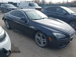 2012 BMW 6 Series 650i xDrive with VIN WBALX5C59CC894383, listed as a IAAI auction lot 40953677 with 104,328 mi miles. Bid and sale history available at carsss.com. Image 1.