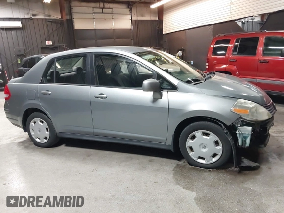 2009 Nissan Versa 1.8 S with VIN 3N1BC11EX9L396439, listed as a IAAI auction lot 42049665 with 49,617 mi miles. Bid and sale history available at carsss.com. Image 13.