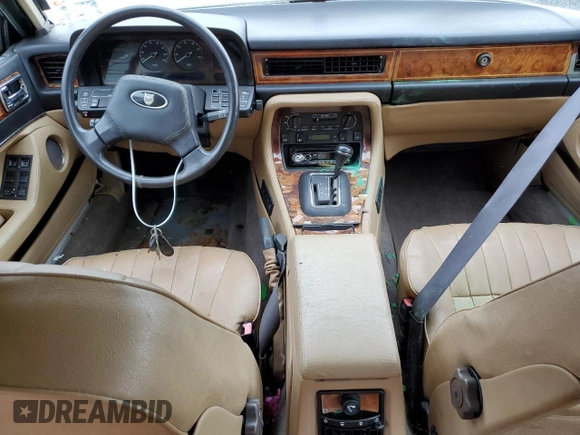 1989 Jaguar XJ with VIN SAJHY1540KC578115, listed as a Copart auction lot 69142274 with Not Provided miles and Clean Title. Bid and sale history available at DreamBid. Image 8.
