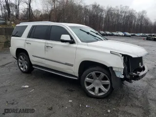 2019 Cadillac Escalade Luxury with VIN 1GYS4BKJ0KR213635, listed as a Copart auction lot 82604024 with 0 mi miles and Salvage Title. Bid and sale history available at carsss.com. Image 4.
