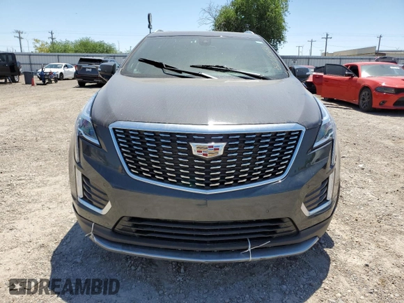 2023 Cadillac XT5 FWD Premium Luxury z VIN 1GYKNCRS0PZ173923, wystawiony jako Copart lot #52212695 z przebiegiem Nie podano mil oraz Szkoda całkowita • Salvage title. Historia ofert i sprzedaży dostępna na DreamBid. Obrazek 5.