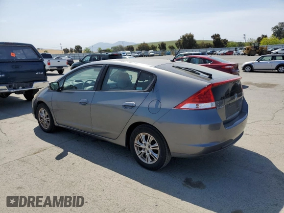 2010 Honda Insight EX with VIN JHMZE2H7XAS021268, listed as a Copart auction lot 54179245 with 211,561 mi miles and Salvage Title. Bid and sale history available at DreamBid. Image 2.