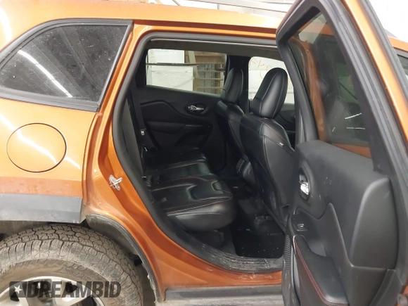 2015 Jeep Cherokee Trailhawk with VIN 1C4PJMBS5FW524462, listed as a IAAI auction lot 41774347 with 107,592 mi miles. Bid and sale history available at carsss.com. Image 8.
