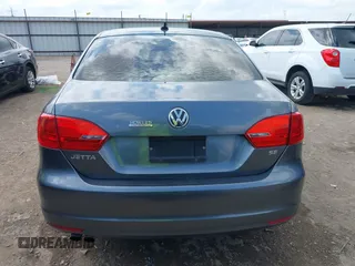 2014 Volkswagen Jetta Sedan SE with VIN 3VWD07AJ7EM238799, listed as a IAAI auction lot 40234990 with 113,297 mi miles. Bid and sale history available at carsss.com. Image 16.