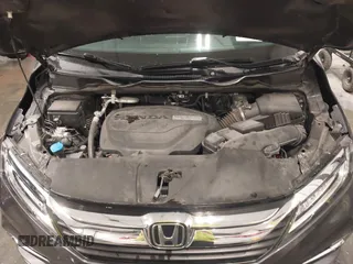 2018 Honda Odyssey Touring with VIN 5FNRL6H84JB041309, listed as a IAAI auction lot 42272247 with 90,371 mi miles and . Bid and sale history available at DreamBid. Image 10.