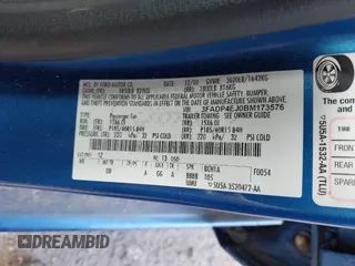 2011 Ford Fiesta SE with VIN 3FADP4EJ0BM173576, listed as a IAAI auction lot 42075691 with 128,835 mi miles. Bid and sale history available at carsss.com. Image 9.