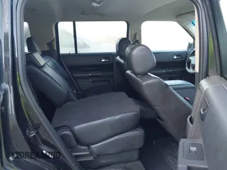 2014 Ford Flex SEL z VIN 2FMGK5C8XEBD24744, wystawiony jako IAAI lot #42365734 z przebiegiem 209 904 mil mil oraz . Historia ofert i sprzedaży dostępna na DreamBid. Obrazek 8.