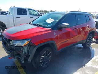 2020 Jeep Compass Trailhawk z VIN 3C4NJDDB5LT162915, wystawiony jako IAAI lot #41654603 z przebiegiem 89 316 mil mil oraz . Historia ofert i sprzedaży dostępna na DreamBid. Obrazek 20.