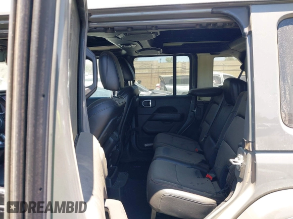 2023 Jeep Wrangler Rubicon with VIN 1C4JJXFG7PW541813, listed as a IAAI auction lot 42640045 with 53,645 mi miles and . Bid and sale history available at DreamBid. Image 8.