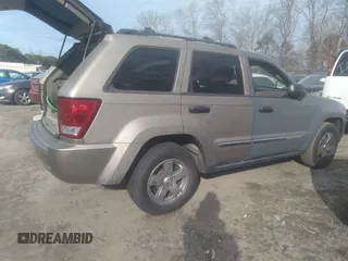 2005 Jeep Grand Cherokee Laredo with VIN 1J4HS48N95C677083, listed as a IAAI auction lot 41452025 with 236,773 mi miles and . Bid and sale history available at DreamBid. Image 1.