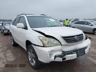 2007 Lexus RX 400h z VIN JTJGW31U572003651, wystawiony jako IAAI lot #42163515 z przebiegiem 358 648 mil mil oraz . Historia ofert i sprzedaży dostępna na DreamBid. Obrazek 1.