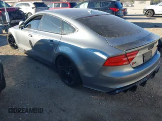 2014 Audi S7 Prestige with VIN WAUW2AFC6EN065356, listed as a IAAI auction lot 40994378 with 150,442 mi miles. Bid and sale history available at carsss.com. Image 3.