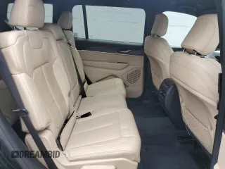 2023 Jeep Grand Cherokee Limited z VIN 1C4RJKBG8P8728476, wystawiony jako Copart lot #57998385 z przebiegiem 21 440 mil mil oraz Szkoda całkowita • Salvage title. Historia ofert i sprzedaży dostępna na DreamBid. Obrazek 11.