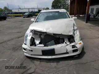 2007 Cadillac STS z VIN 1G6DW677670117293, wystawiony jako Copart lot #57677065 z przebiegiem 95 907 mil mil oraz Szkoda całkowita • Salvage title. Historia ofert i sprzedaży dostępna na DreamBid. Obrazek 5.