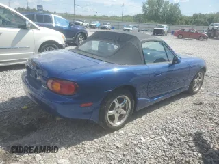 1999 Mazda MX-5 Miata with VIN JM1NB353XX0134898, listed as a Copart auction lot 63429475 with 140,595 mi miles and Clean title. Bid and sale history available at DreamBid. Image 3.