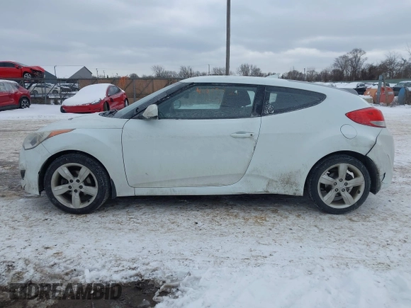 2013 Hyundai Veloster w/Black Int with VIN KMHTC6AD9DU171722, listed as a IAAI auction lot 41617721 with 115,791 mi miles and . Bid and sale history available at DreamBid. Image 14.