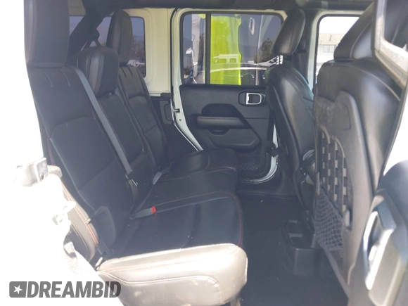2018 Jeep Wrangler Unlimited Rubicon with VIN 1C4HJXFN8JW215023, listed as a IAAI auction lot 42227099 with 62,195 mi miles and . Bid and sale history available at DreamBid. Image 8.