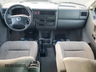 2003 Volkswagen EuroVan MV с VIN WV2MB47053H002505, выставлен на аукционе Copart как лот 83840884 с пробегом 250 786 миль миль и Чистый • Clean title. История ставок и продаж доступна на DreamBid. Изображение 8.