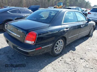 2002 Hyundai XG350 L with VIN KMHFU45E62A218303, listed as a IAAI auction lot 41487179 with 154,300 mi miles. Bid and sale history available at carsss.com. Image 4.