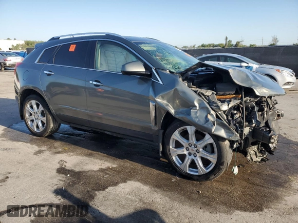2013 Cadillac SRX Performance Collection with VIN 3GYFNDE39DS568052, listed as a Copart auction lot 52027255 with 96,579 mi miles and Salvage Title. Bid and sale history available at carsss.com. Image 4.