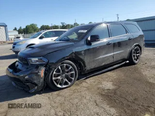 2023 Dodge Durango SRT Hellcat Premium z VIN 1C4SDJH93PC584831, wystawiony jako Copart lot #68612584 z przebiegiem 7 379 mil mil oraz Szkoda całkowita • Salvage title. Historia ofert i sprzedaży dostępna na DreamBid. Obrazek 1.