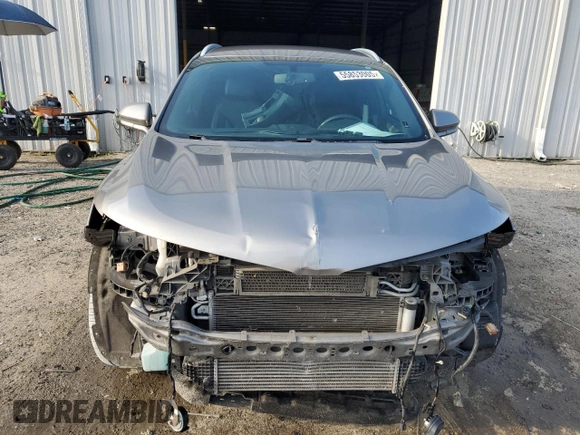 2017 Lincoln MKC Premiere z VIN 5LMCJ1C95HUL16078, wystawiony jako Copart lot #55853005 z przebiegiem 114 821 mil mil oraz Szkoda całkowita • Salvage title. Historia ofert i sprzedaży dostępna na DreamBid. Obrazek 5.