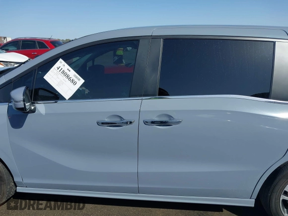 2024 Honda Odyssey Touring with VIN 5FNRL6H82RB027601, listed as a IAAI auction lot 41808680 with 25,911 mi miles and . Bid and sale history available at DreamBid. Image 14.