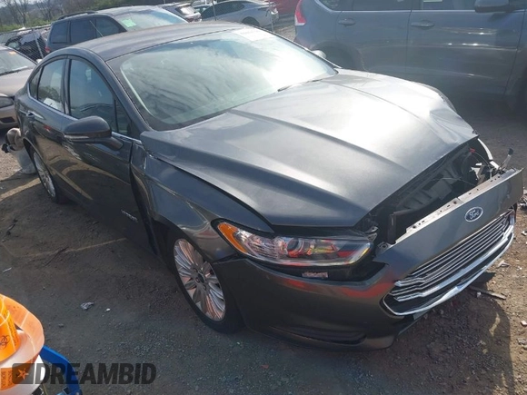 2016 Ford Fusion SE Hybrid with VIN 3FA6P0LU7GR218781, listed as a IAAI auction lot 41844791 with 214,867 mi miles. Bid and sale history available at carsss.com. Image 1.