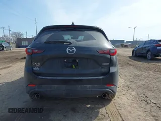 2023 Mazda CX-5 S Premium with VIN JM3KFBDM7P0201038, listed as a IAAI auction lot 41772989 with 26,227 mi miles and . Bid and sale history available at DreamBid. Image 16.