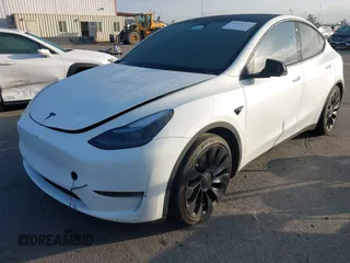 2022 Tesla Model Y Performance with VIN 7SAYGDEF1NF559572, listed as a IAAI auction lot 41516070 with 43,240 mi miles and . Bid and sale history available at DreamBid. Image 18.