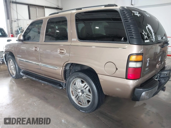 2004 GMC Yukon SLT with VIN 1GKEK13Z84R265500, listed as a IAAI auction lot 41412544 with 259,575 mi miles. Bid and sale history available at carsss.com. Image 3.