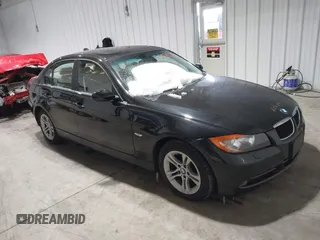 2008 BMW 3 Series 328xi with VIN WBAVC93538K043317, listed as a IAAI auction lot 41544348 with 127,823 mi miles. Bid and sale history available at carsss.com. Image 1.
