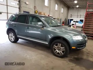 2004 Volkswagen Touareg z VIN WVGCM67L94D032492, wystawiony jako Copart lot #72205044 z przebiegiem 98 482 mil mil oraz Tytuł czysty. Historia ofert i sprzedaży dostępna na DreamBid. Obrazek 4.